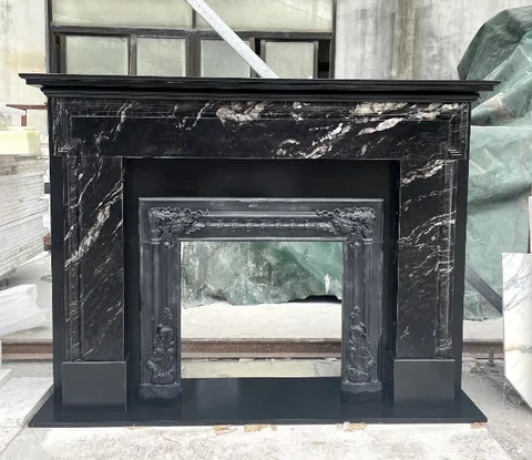 White Volakas marble fireplace surround, showing a single main form with workshop equipment nearby