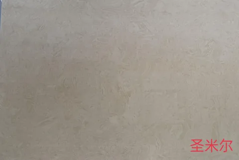 cream-beige engineered stone slab, with cloudy mottling and subtle pattern contrast and an uncluttered setting