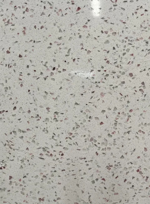 white engineered stone slab, shown from an overhead view with an uncluttered setting