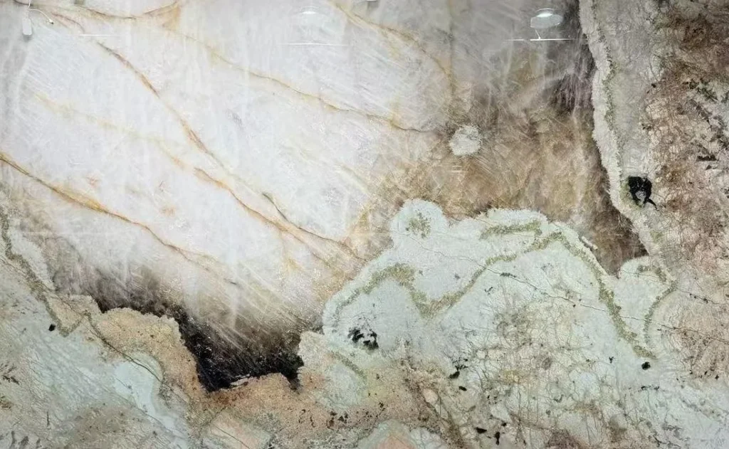 white stone slab, with bold veining and a reflective finish, in a close surface view