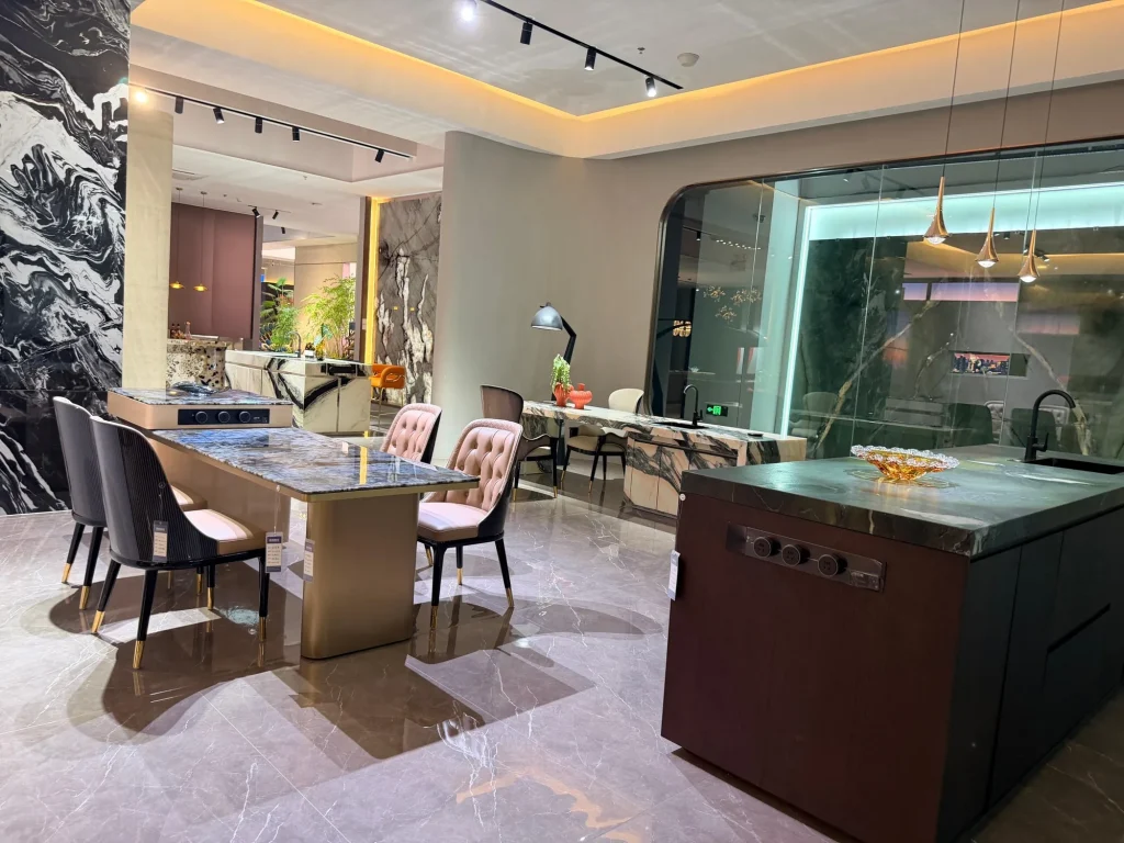black stone countertop, with bold veining and a reflective finish, in a showroom