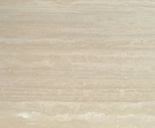 cream-beige stone slab, with linear travertine grain, in a close surface view