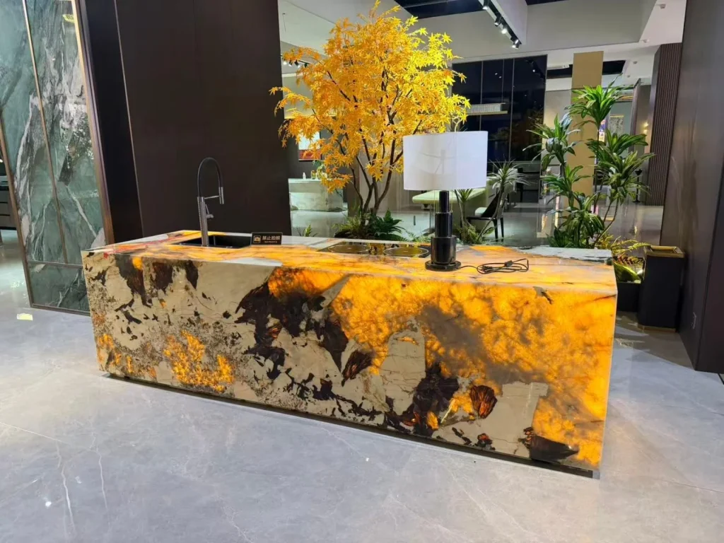 gold stone countertop, with a single-level island and cloudy mottling, in a showroom