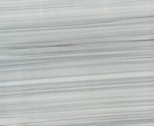 gray stone slab, with banded onyx-like striping, in a close surface view