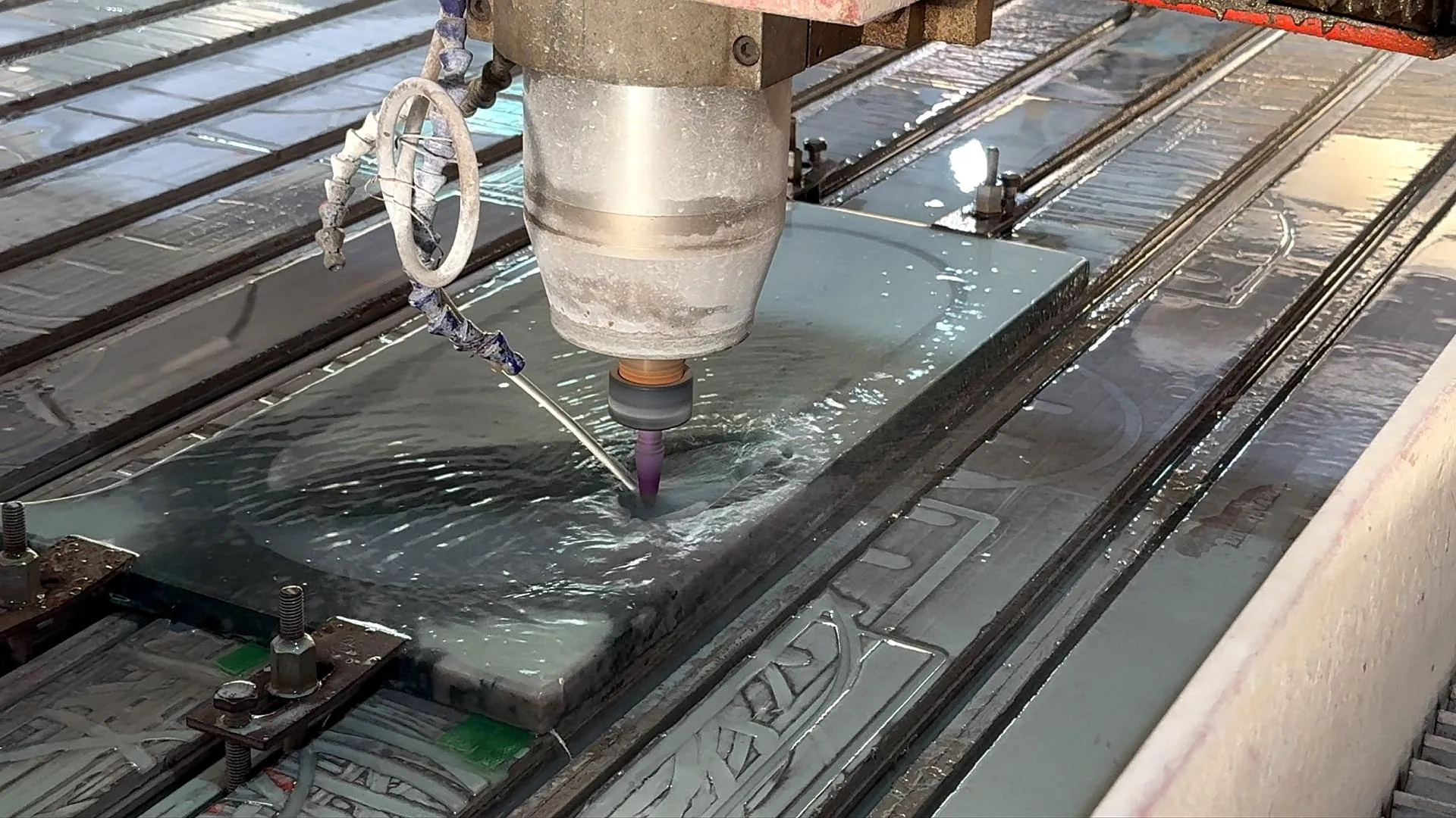 gray stone slab, with a single full slab and a plain surface, in a workshop