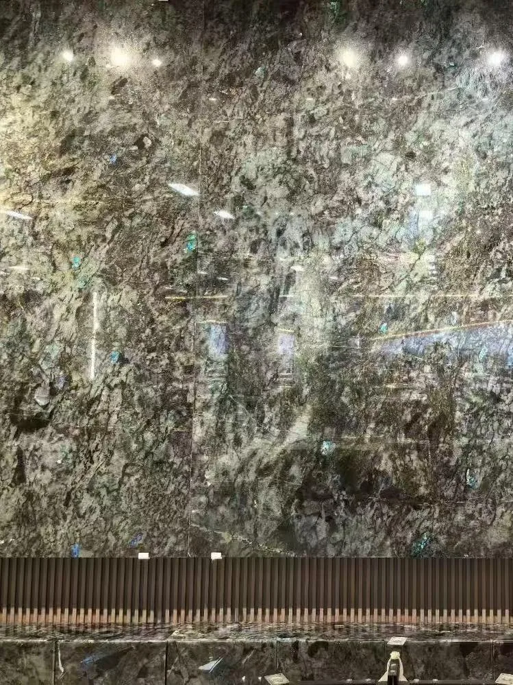 green stone wall feature, with large veined wall panels and cloudy mottling