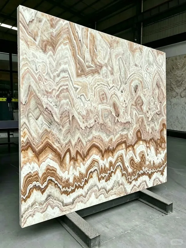 Multicolor onyx slab with banded veining