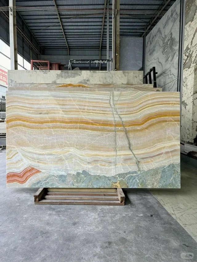 Multicolor onyx slab with banded veining