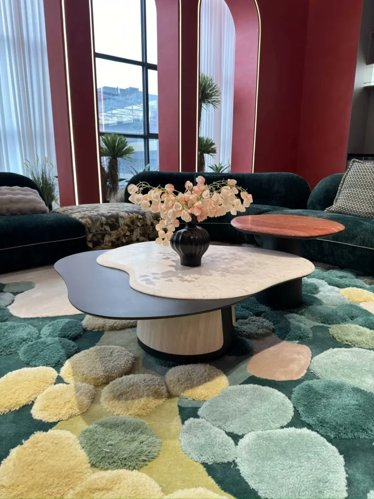Red travertine coffee table with linear veining