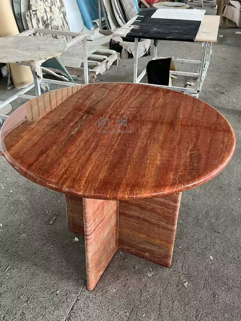 Red travertine dining table with linear veining