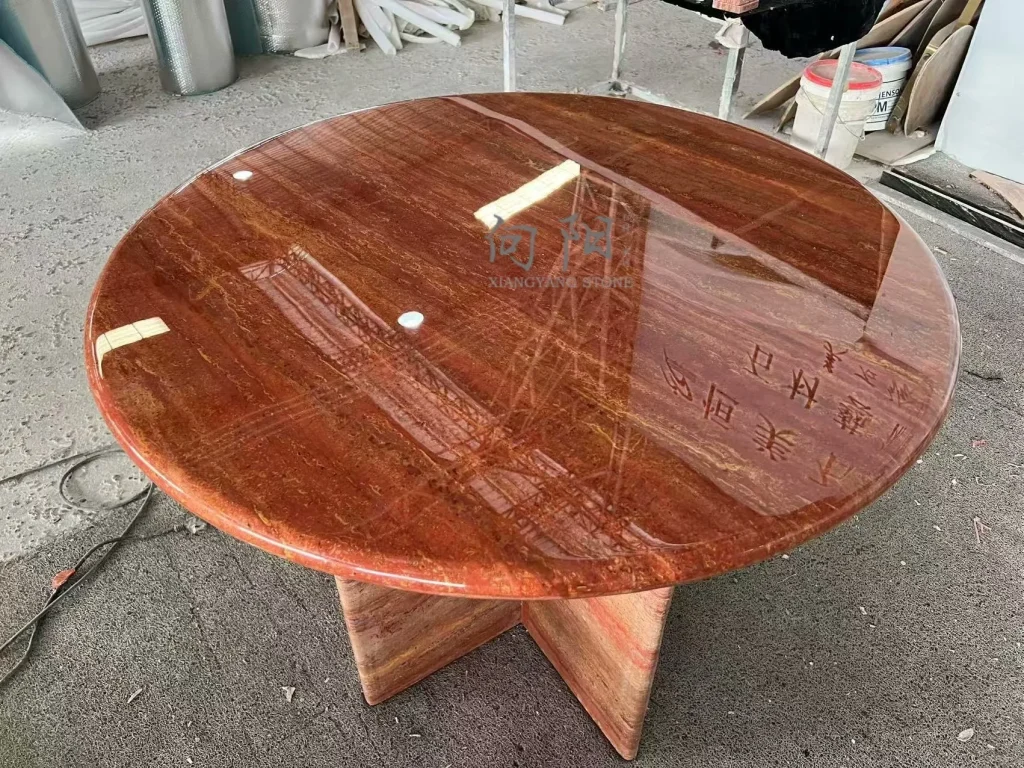 Red travertine dining table with linear veining