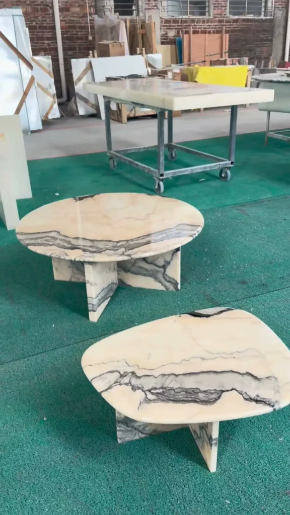 Smoke pink stone coffee table with cloudy veining