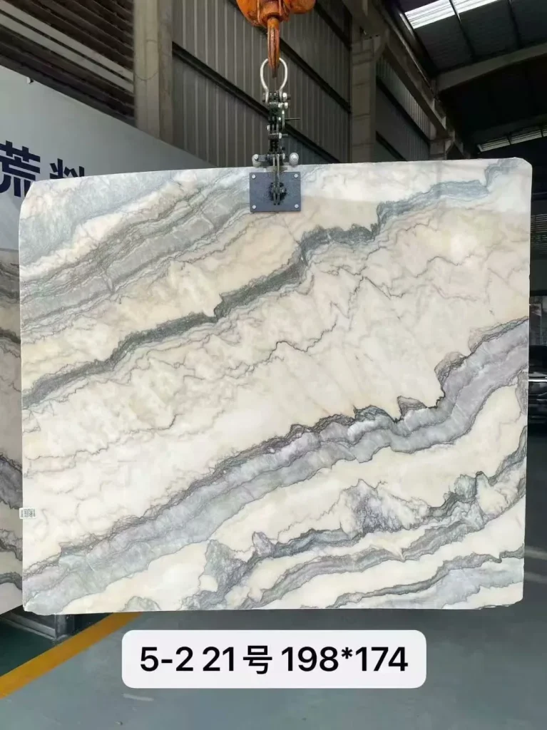 Smoke pink stone dining table with cloudy veining