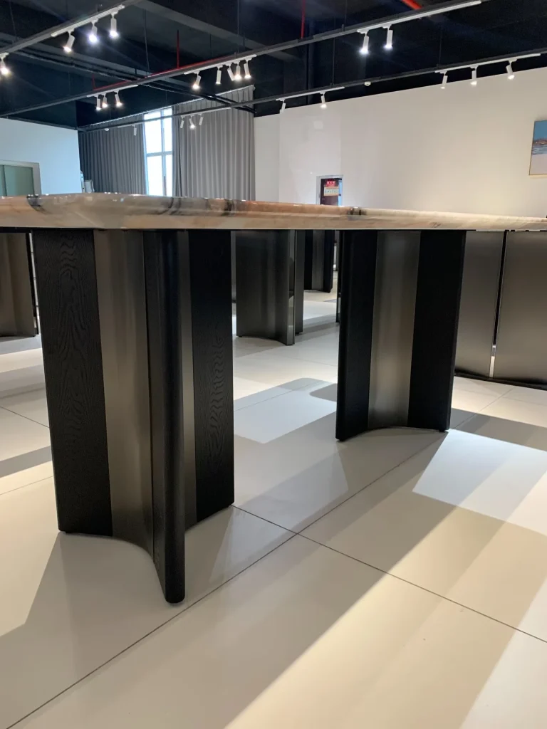 Smoke pink stone dining table with cloudy veining