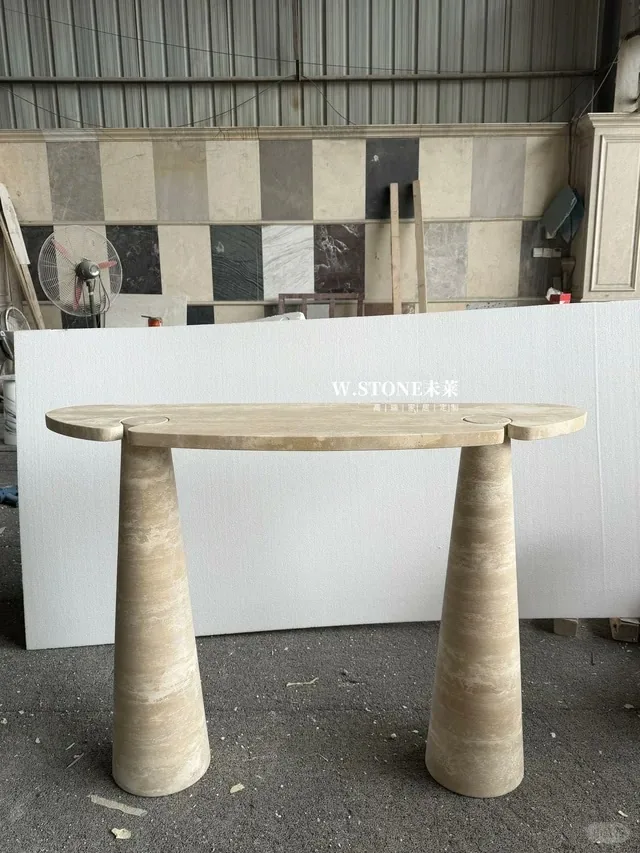 White travertine console table with linear veining