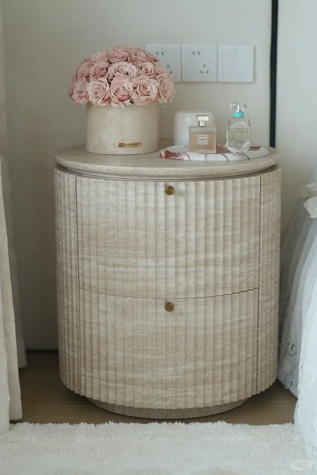 White travertine nightstand with linear veining