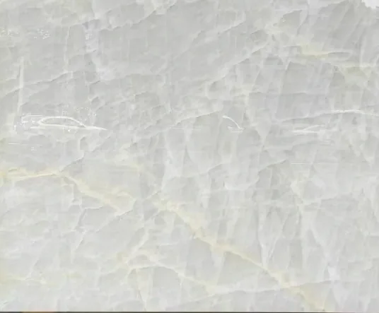 white stone slab, with a single full slab and fine veining, in a close surface view